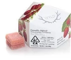 Wyld cannabis-infused strawberry gummies package with two pink gummies beside it.